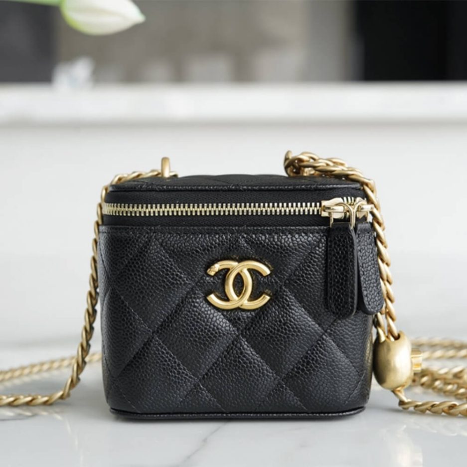 Ch**el small gold ball makeup bag